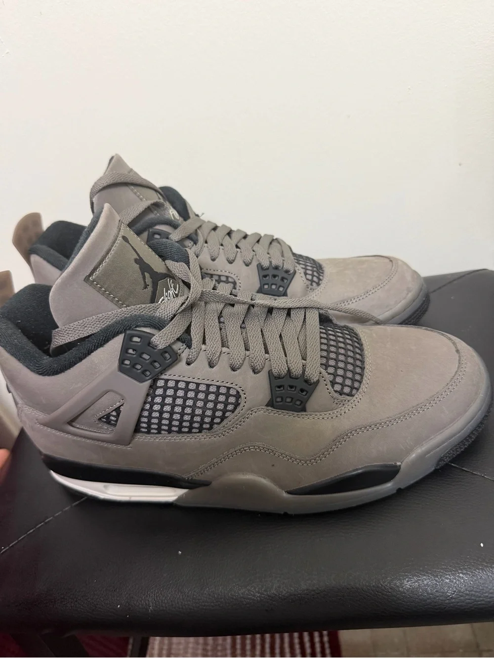 Jordan Retro 4 Sneakers in Grey and Black